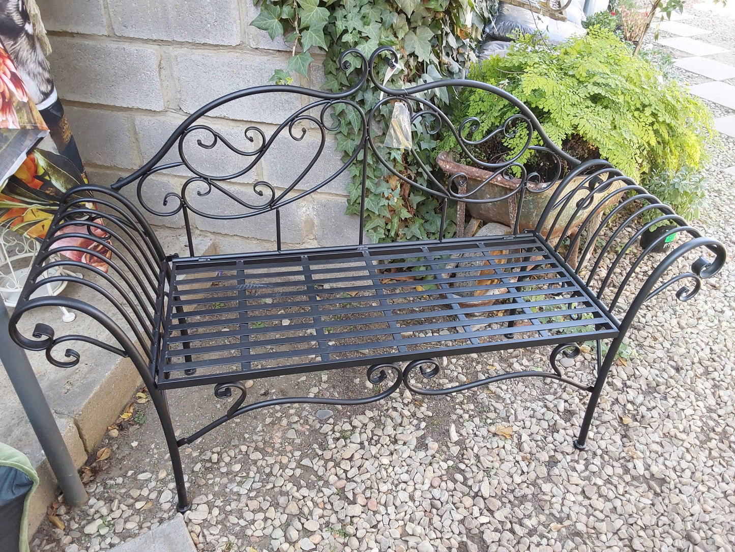 Elegant steel two seater bench