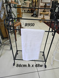 Standing towel rack